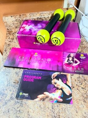 Zumba Fitness Exhilarate Body Shaping System Workout Kit with toning sticks